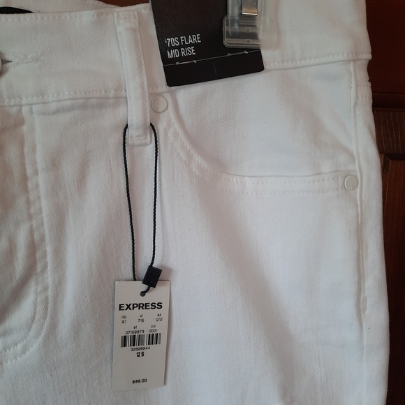 🛍 NWT Express 70s Flare Mid-rise white denim jeans size 12 short - Picture 5 of 15